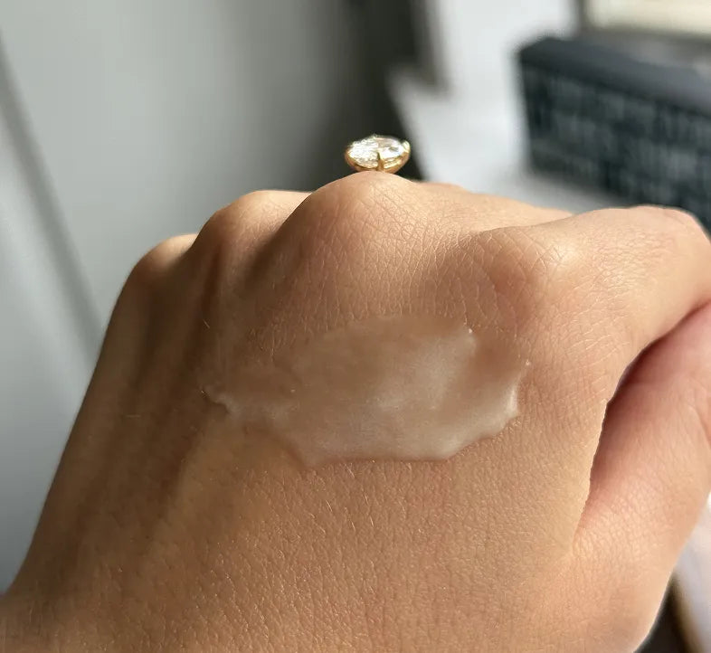 LUTÉA cream on the back of a hand